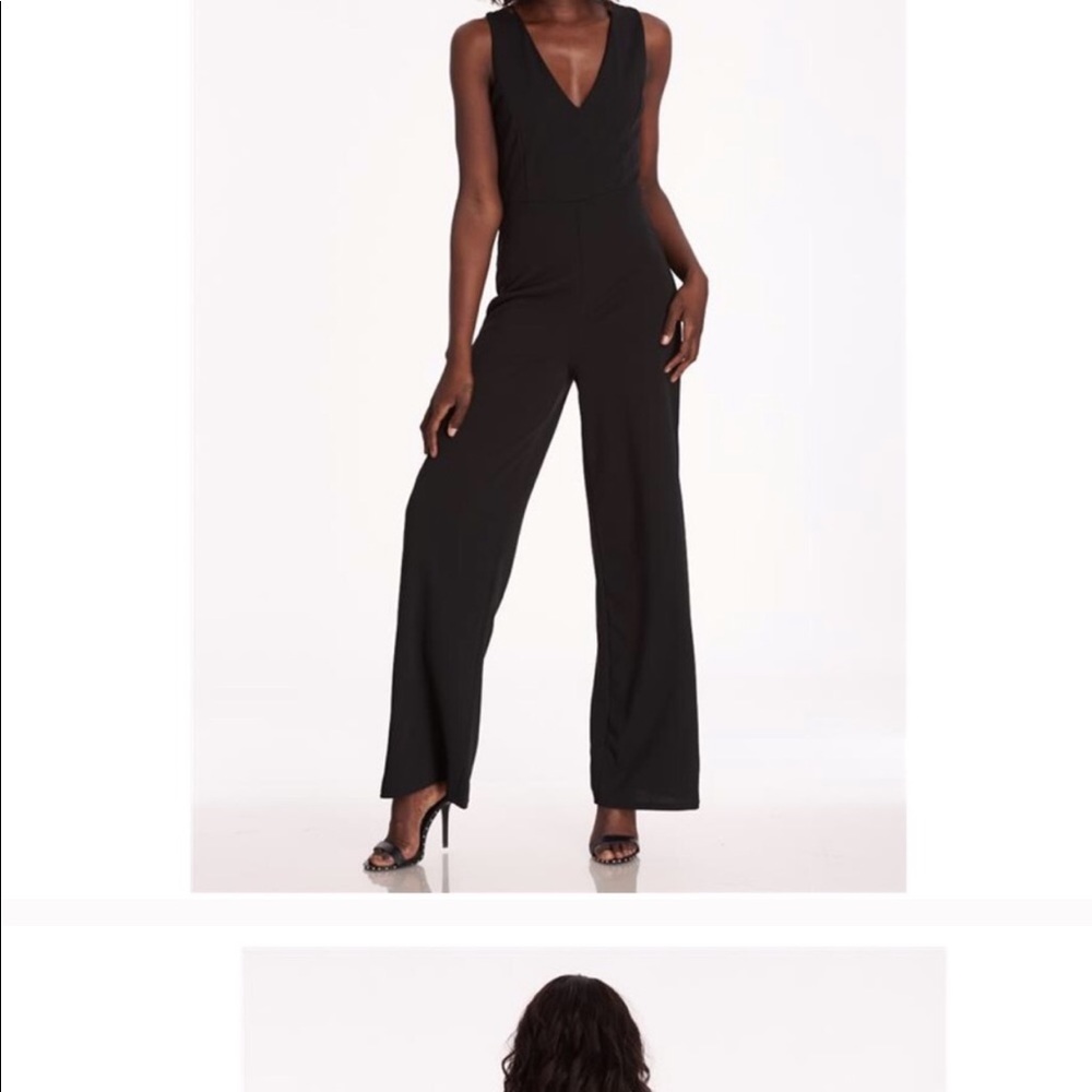 Black Cross back Jumpsuit Size Medium